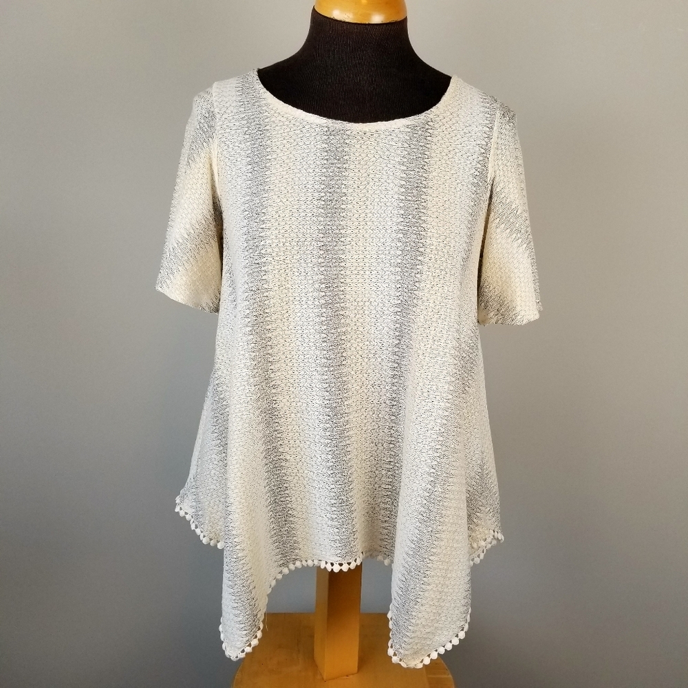 Potter's Pot shark bite hem tie back knit top